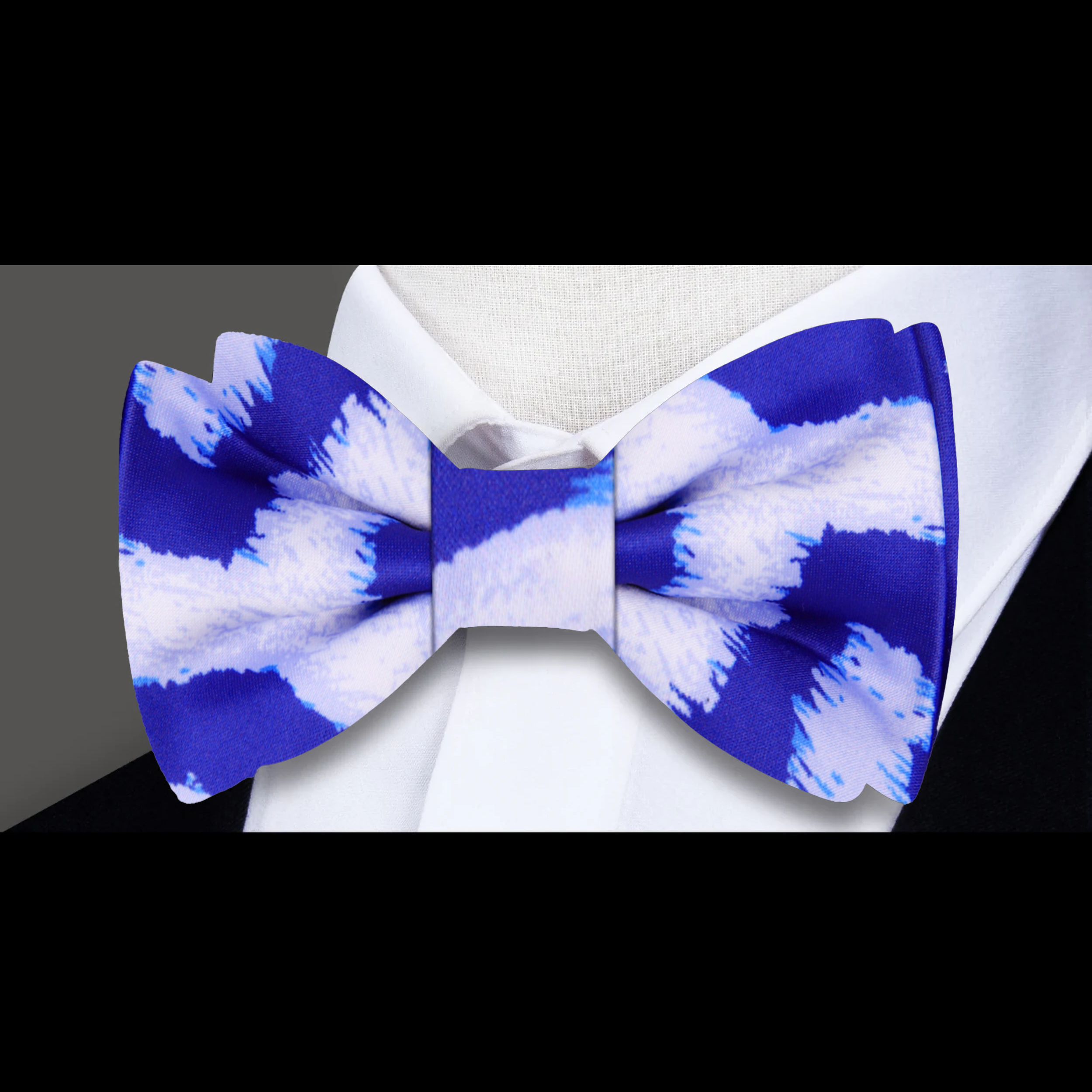 Styled with a light blue dress shirt for a cocktail party look