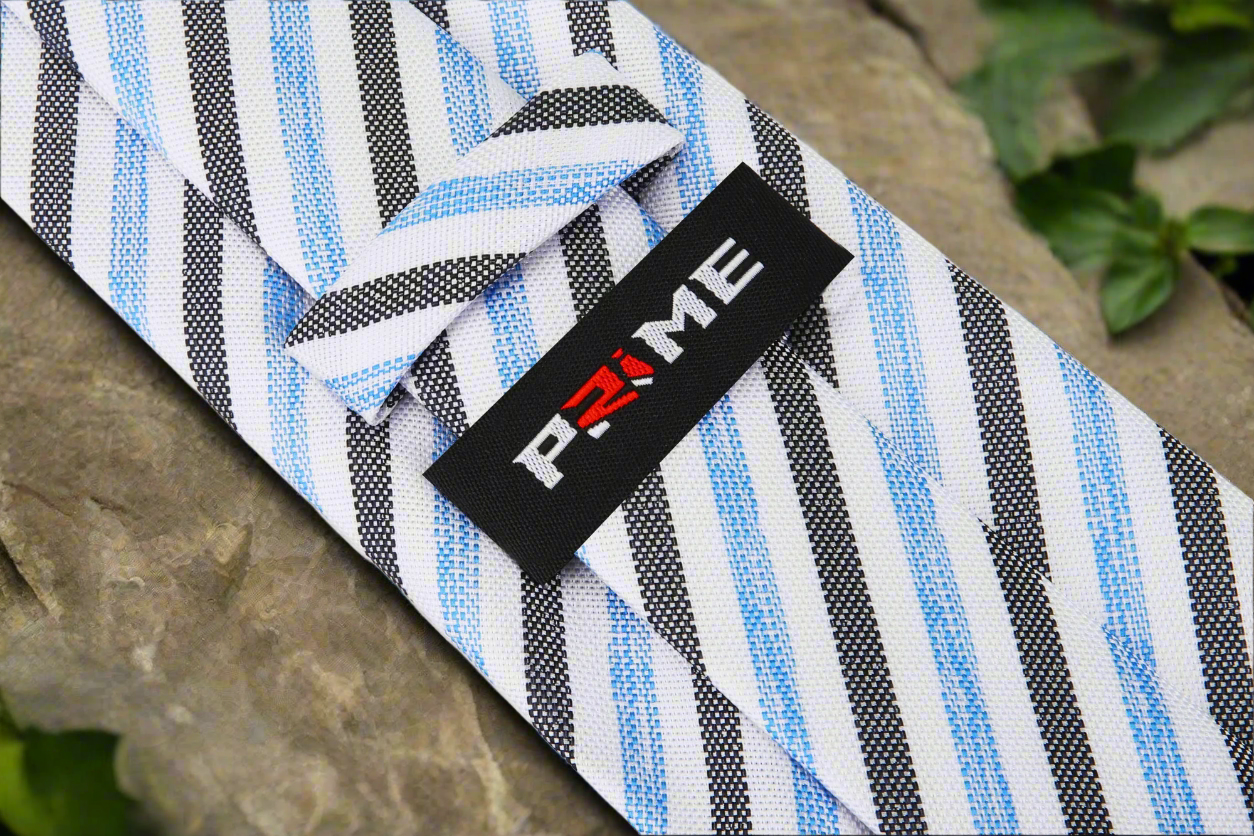 Man wearing a silk tie paired with a dress shirt and suit jacket