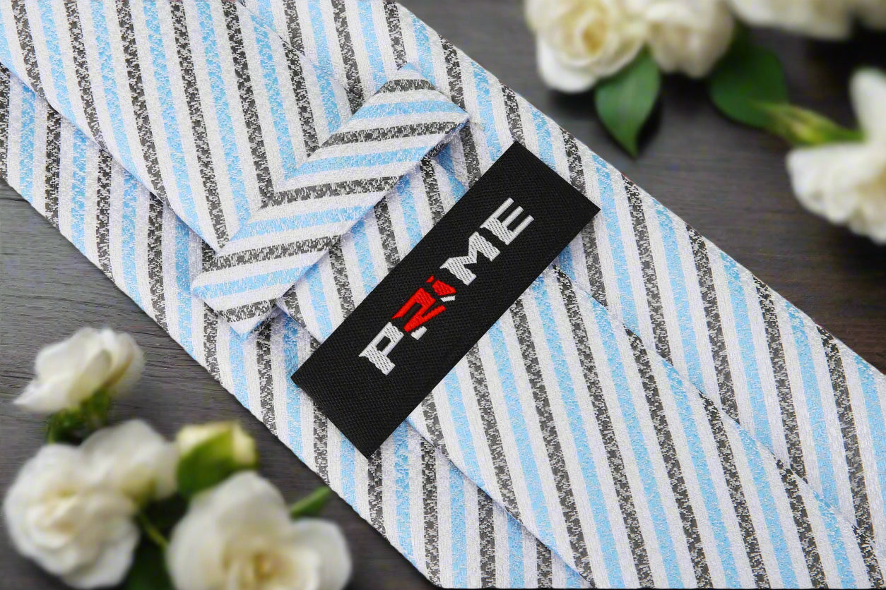 Fashionable silk necktie with blue stripes paired with a white dress shirt