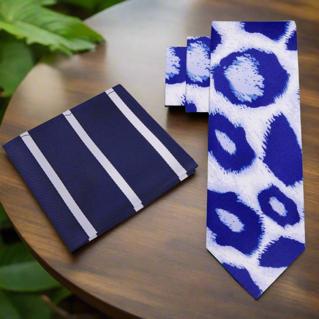 Close-up of Frostwyke silk tie showing blue leopard pattern on white background