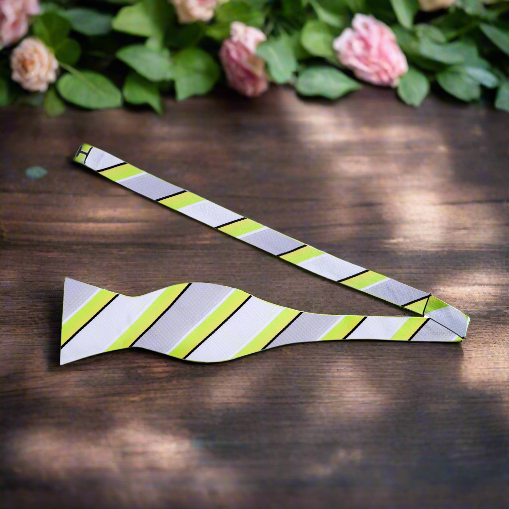 Lime green striped self-tie bow tie displayed on a white background
