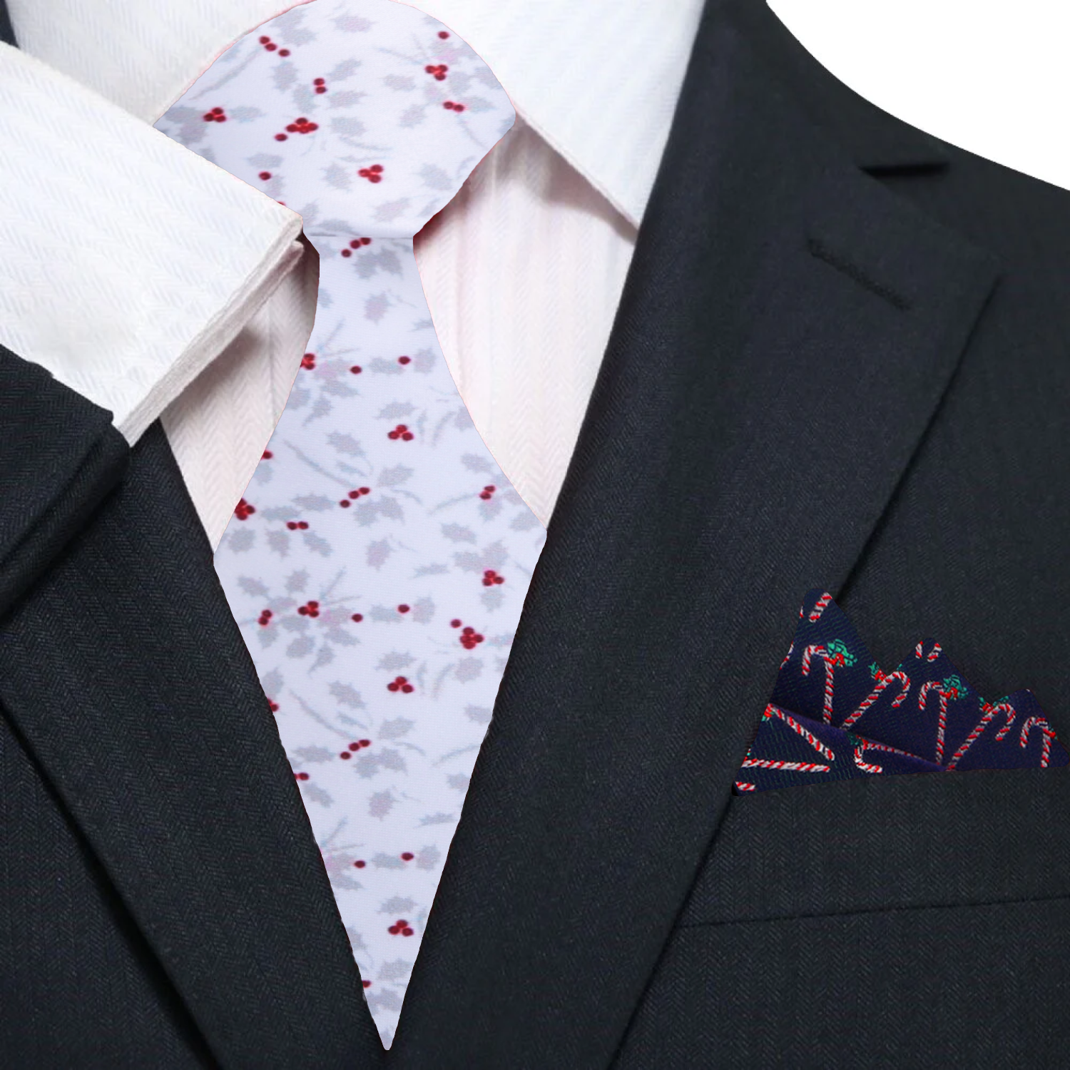 Man wearing the Christmas holly berry necktie with a navy suit at a holiday party.