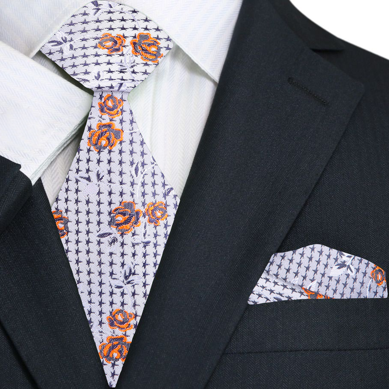 Close-up of the intricate vine and flower pattern on a stylish silk necktie