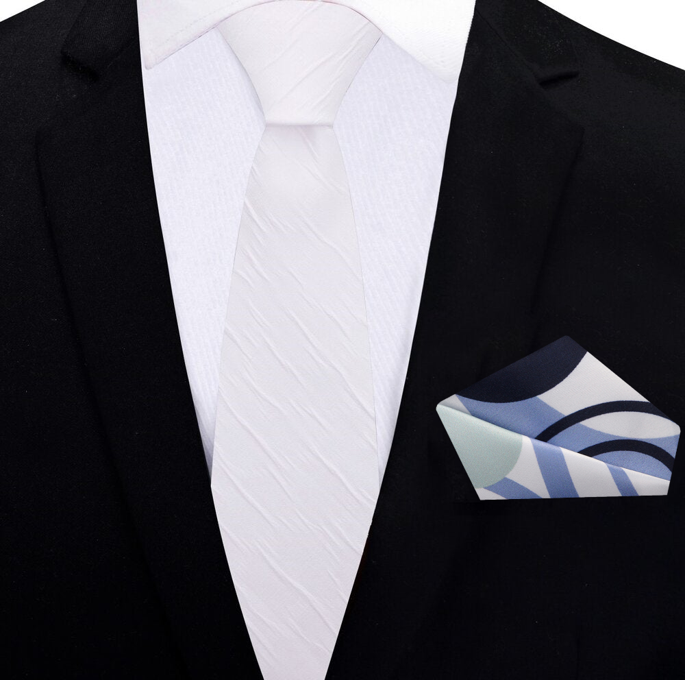 Model wearing the best mens white silk tie for events, demonstrating its versatility and elegance.