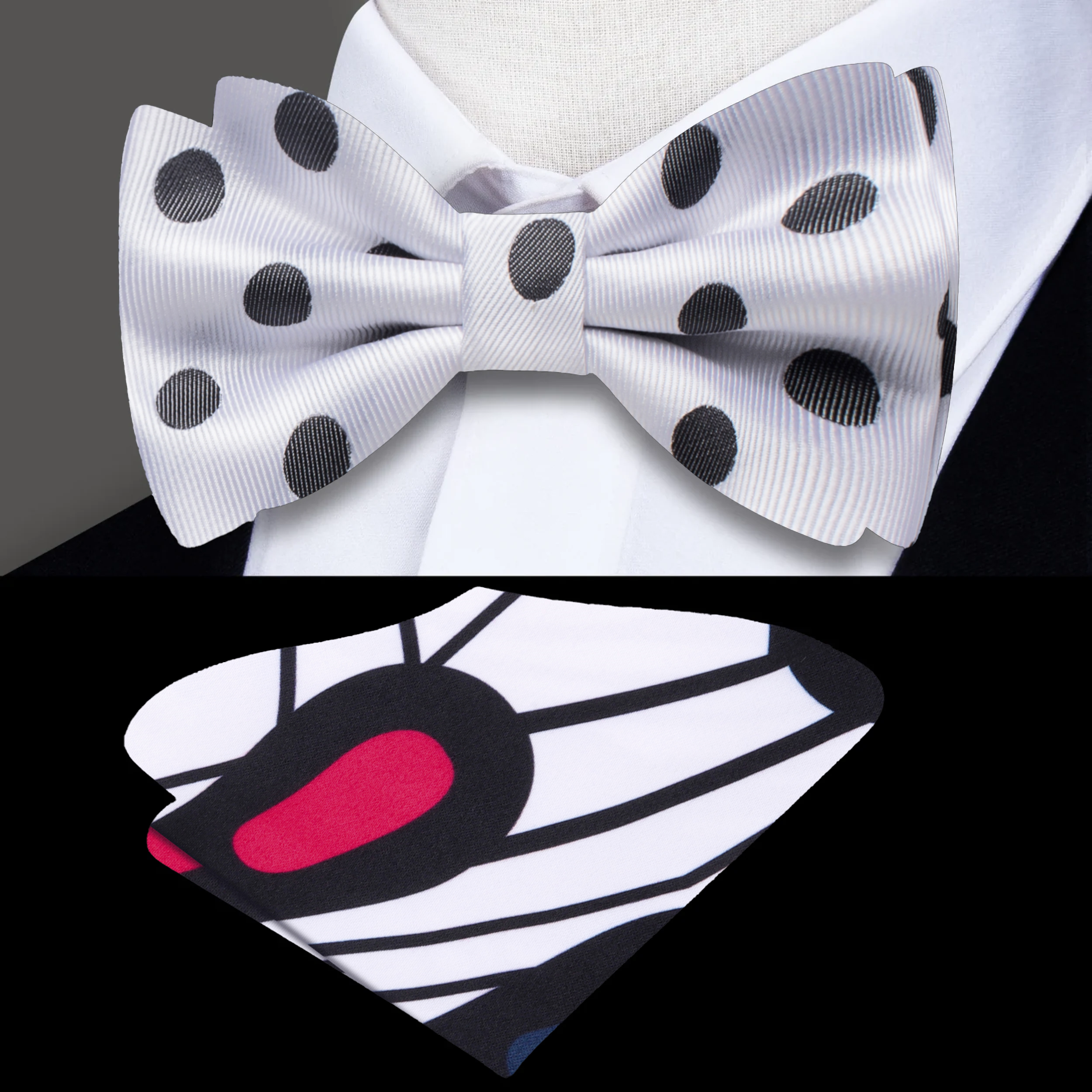 Close-up of the Monroe black and white polka dot bow tie on a solid black dress shirt