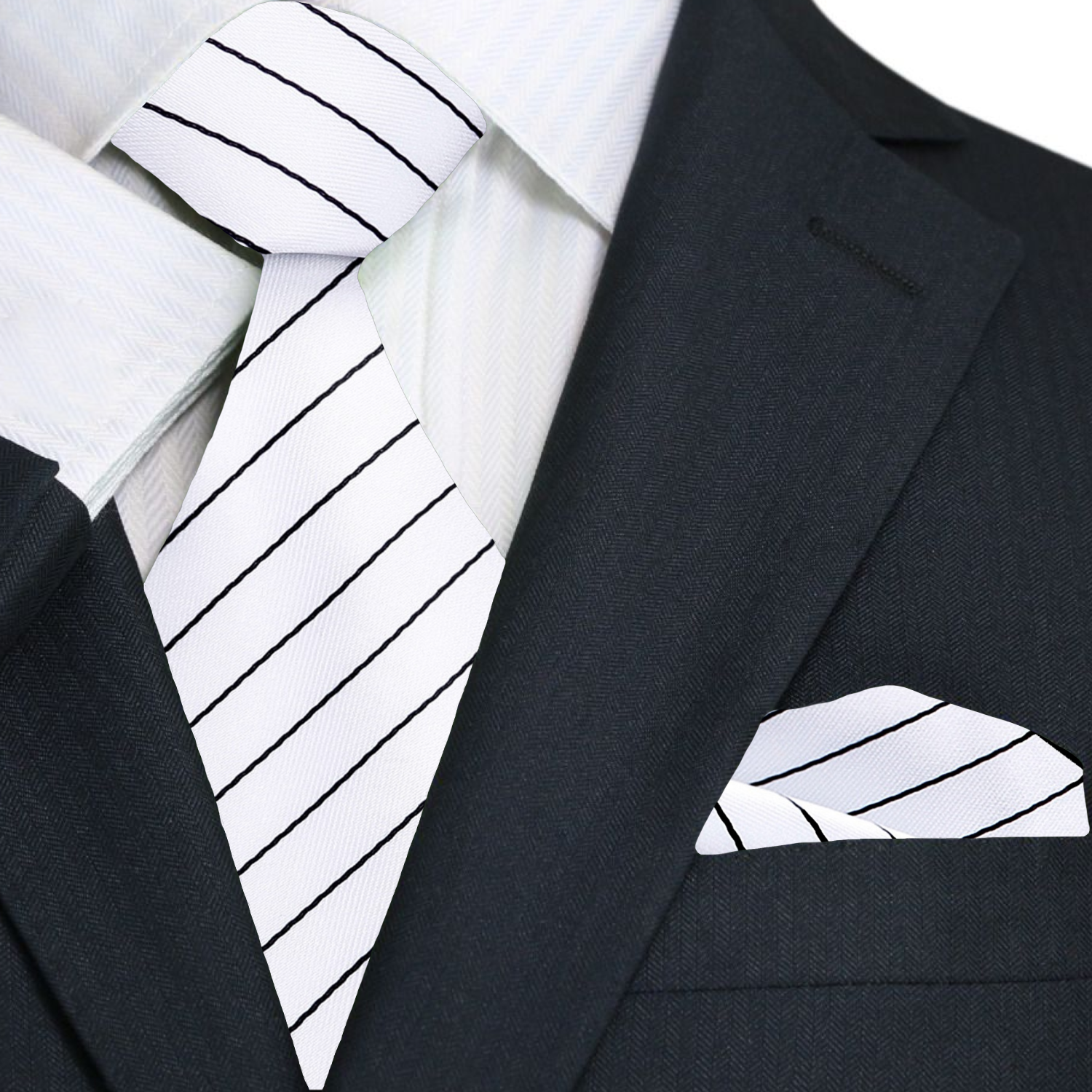A model wearing the white striped necktie with a tailored suit, perfect for formal events