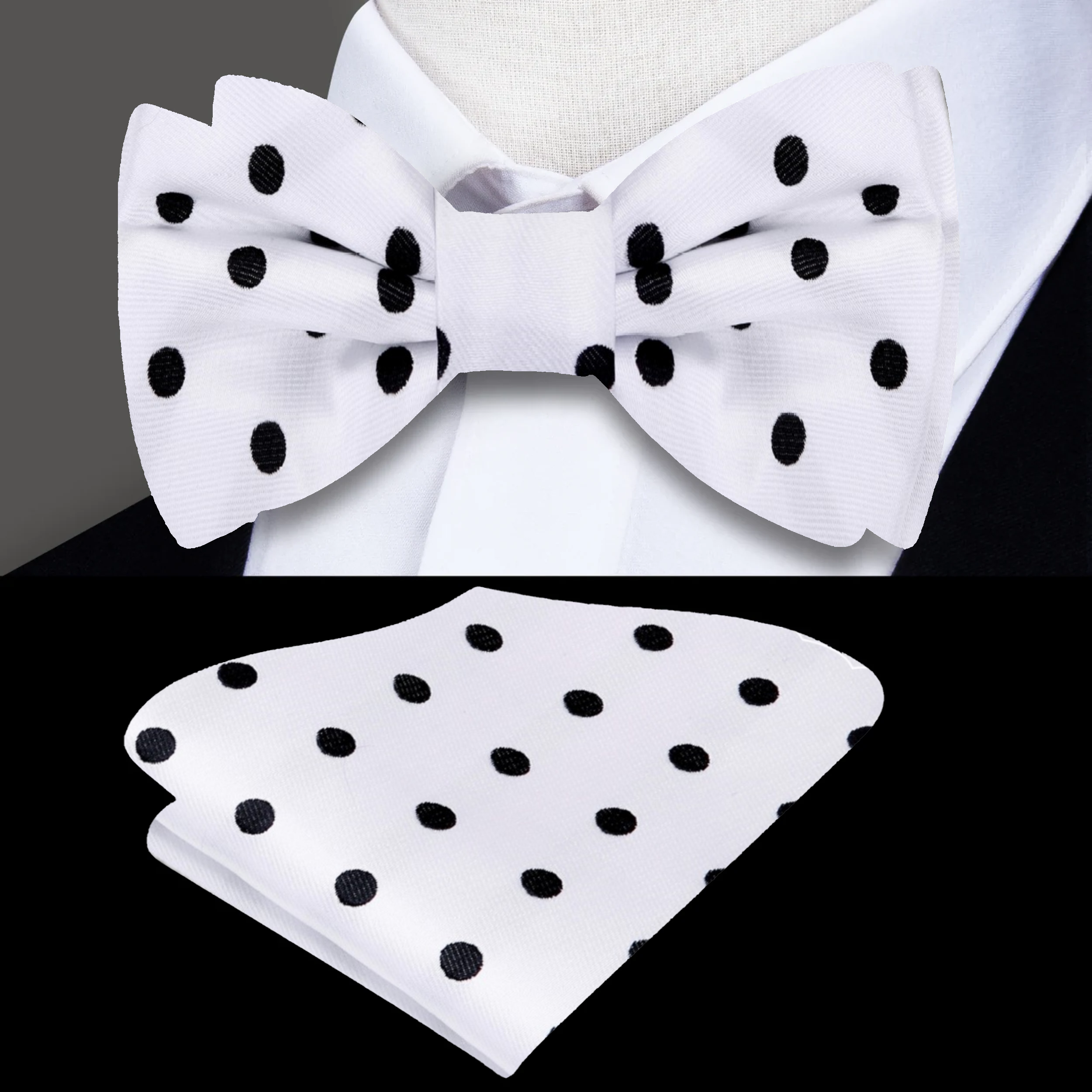 Close-up of the silk bow tie, highlighting the small white dots against the black fabric.