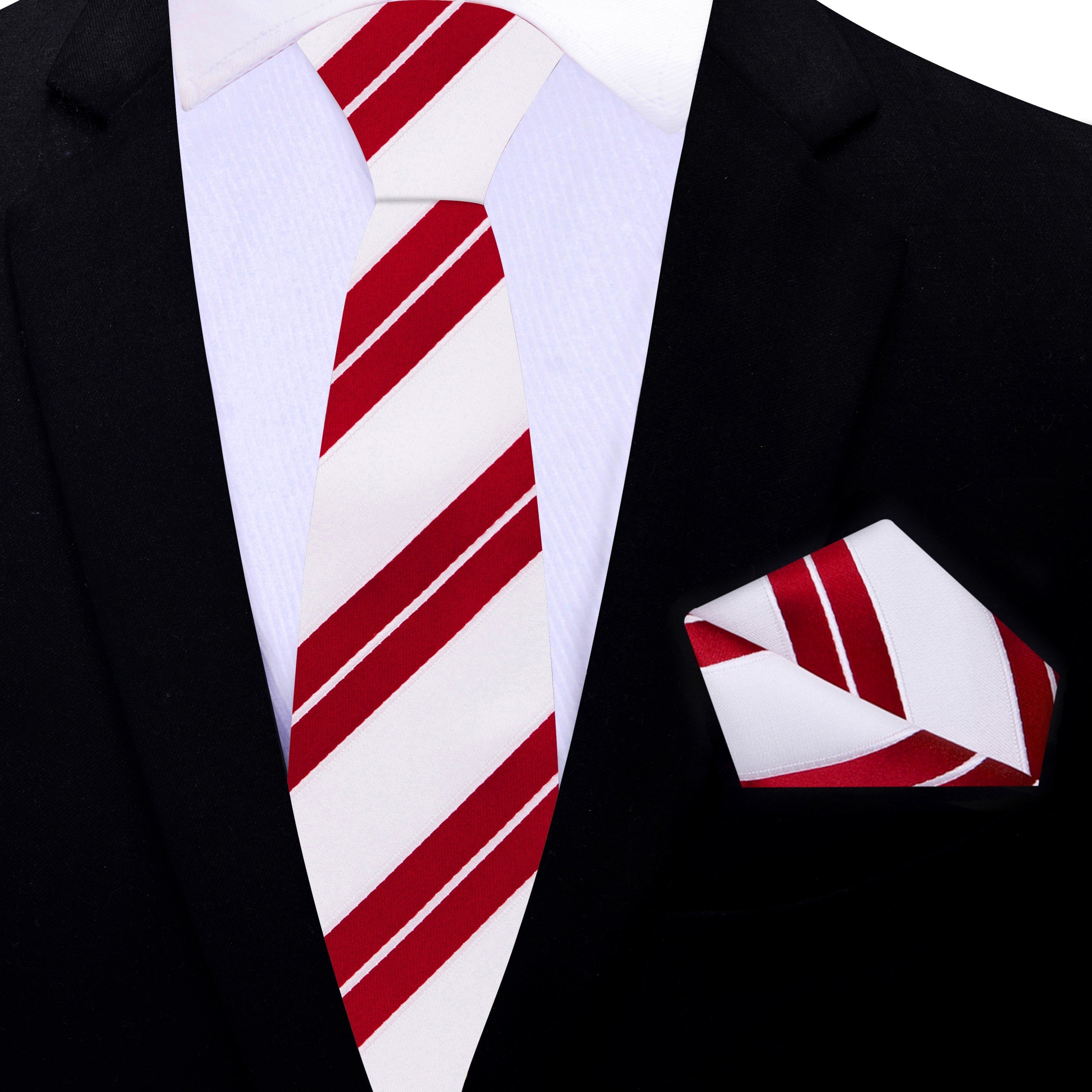 Man wearing a classic red striped tie paired with a charcoal grey suit, ideal for business meetings.