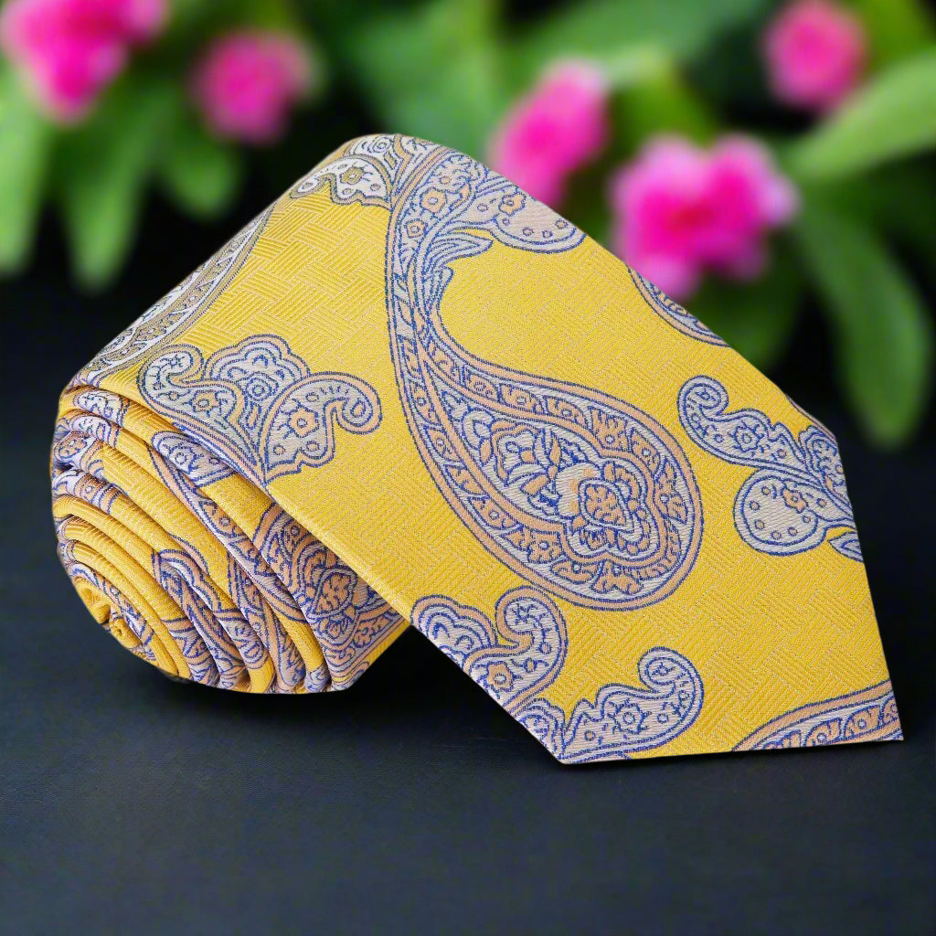 Close-up of vibrant paisley necktie showcasing its intricate design and silk texture.