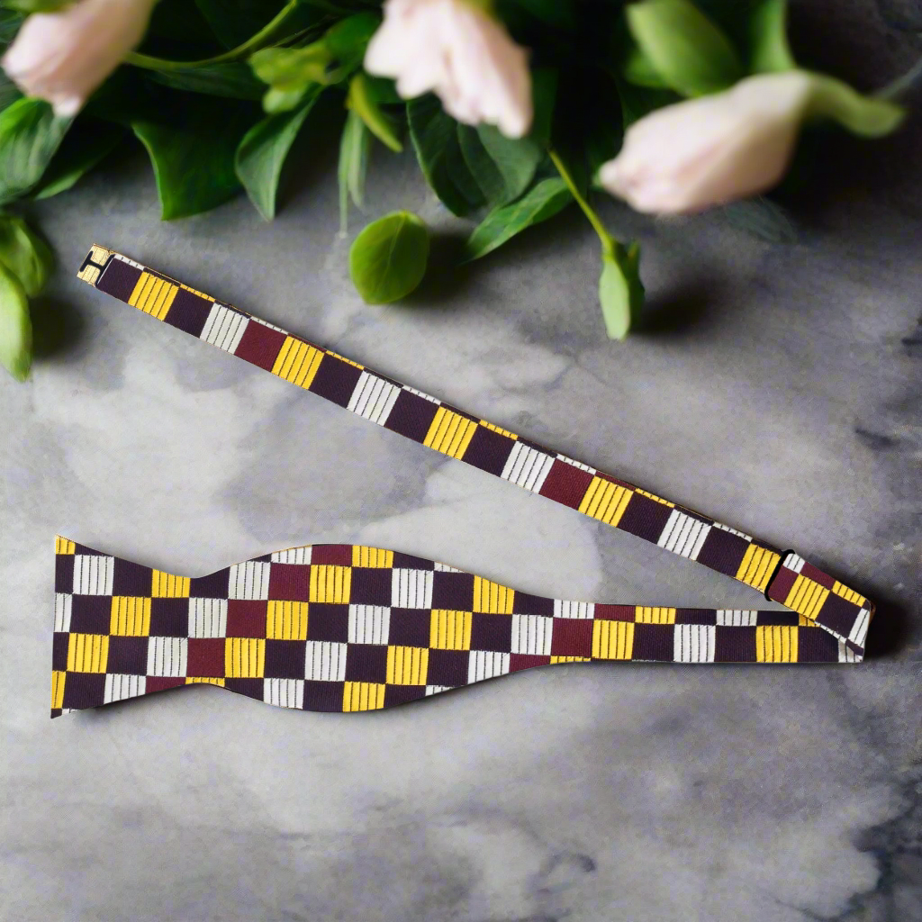 Close-up of the textured fabric and pattern of a silk bow tie