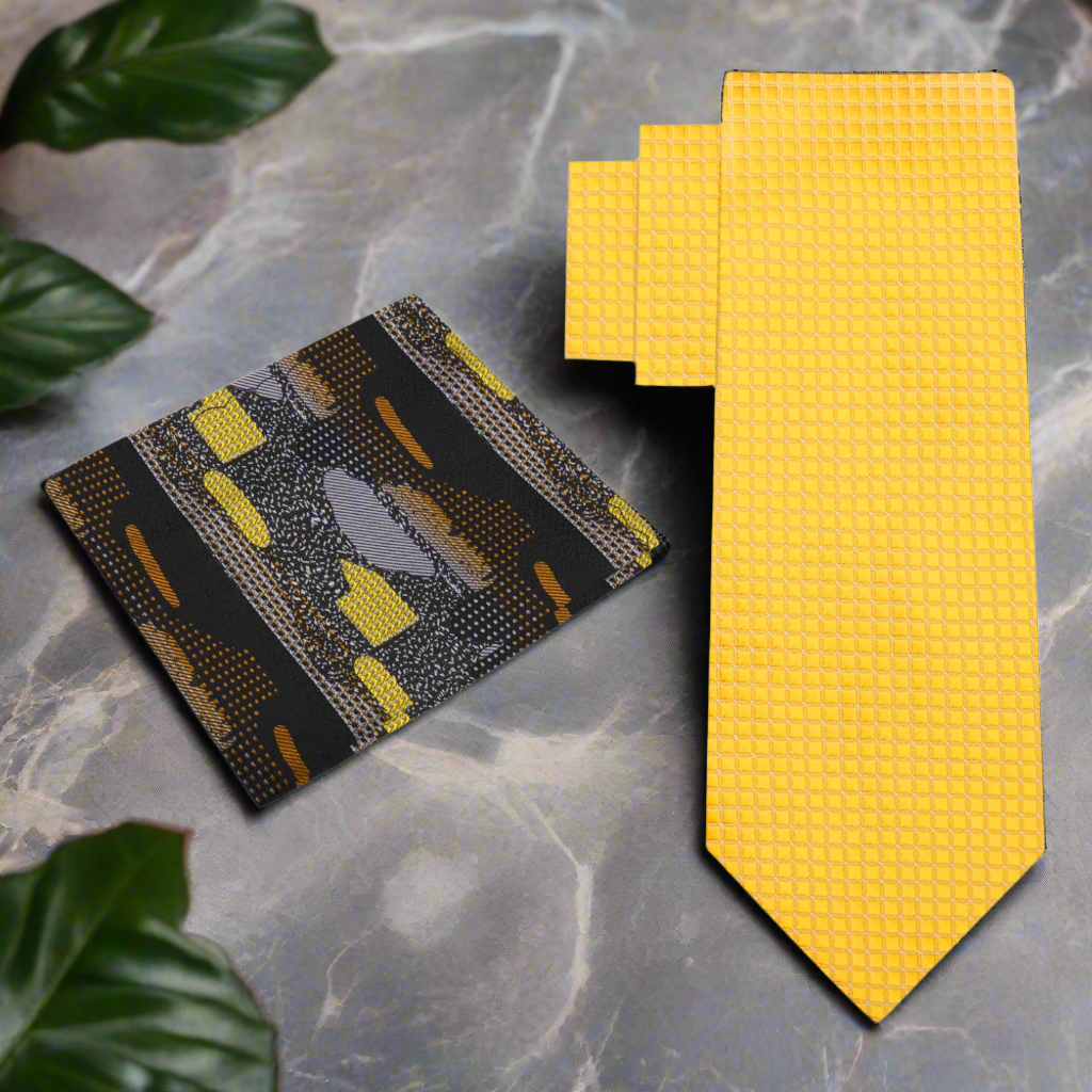 Yellow necktie displayed on a suit, ideal for weddings and formal events.