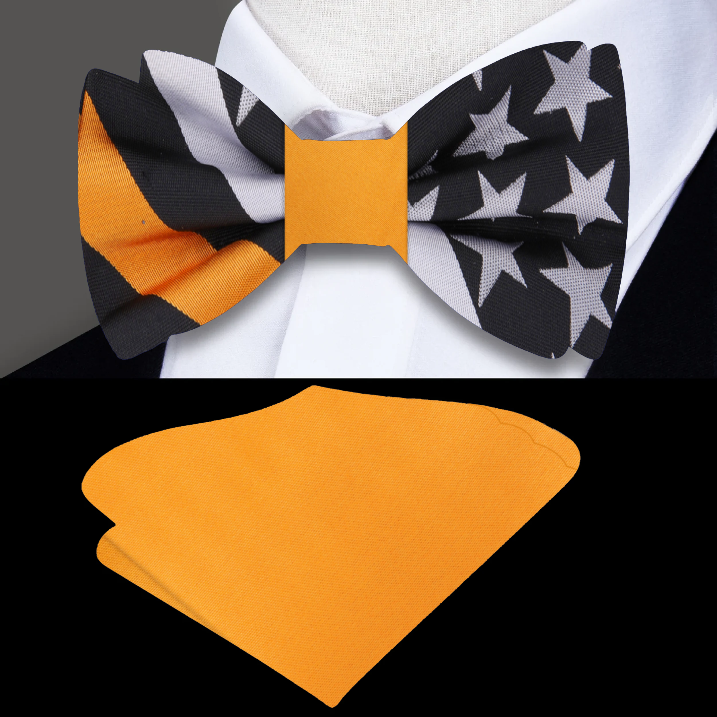 Black, Grey, and Yellow Gold American Flag Bow Tie displayed on a wooden table with a crisp white shirt in the background.