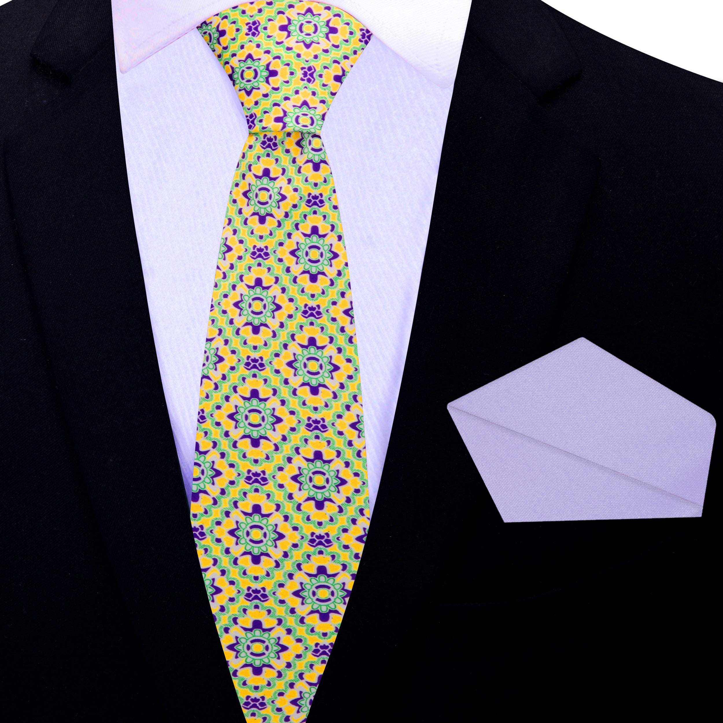 Model wearing a stylish mens tie for summer events, paired with a light grey suit.