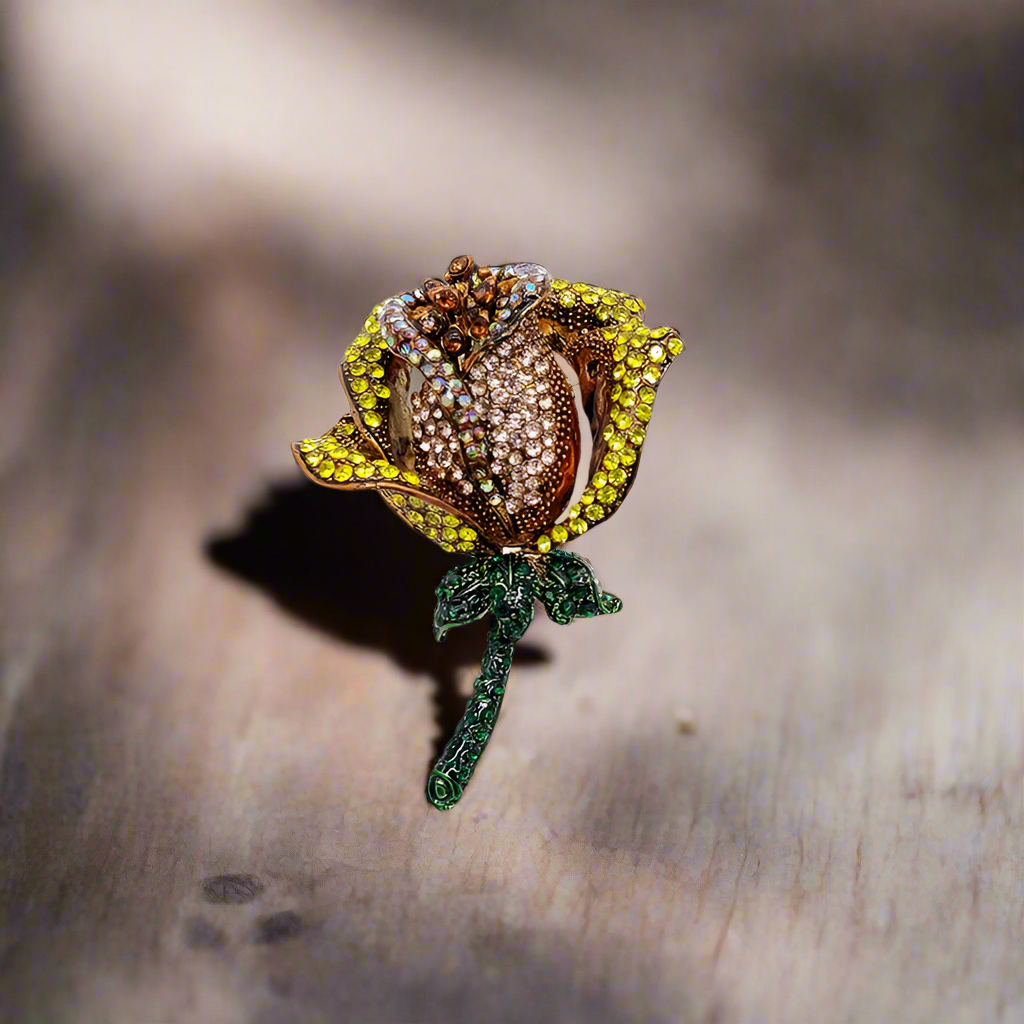 Stylish rose pin against a light blue dress shirt, showcasing modern elegance.