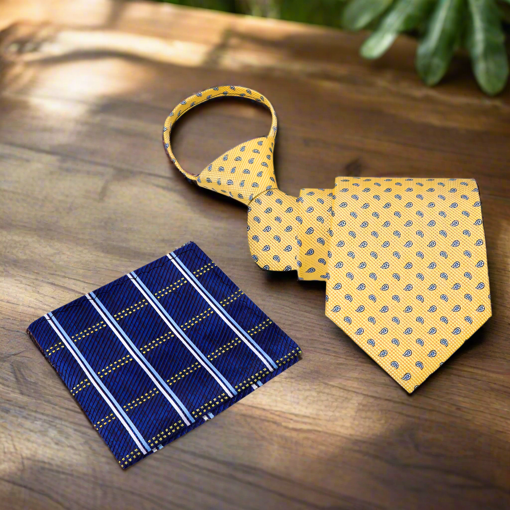 Vertical shot of yellow paisley silk tie on a dress shirt for formal occasion