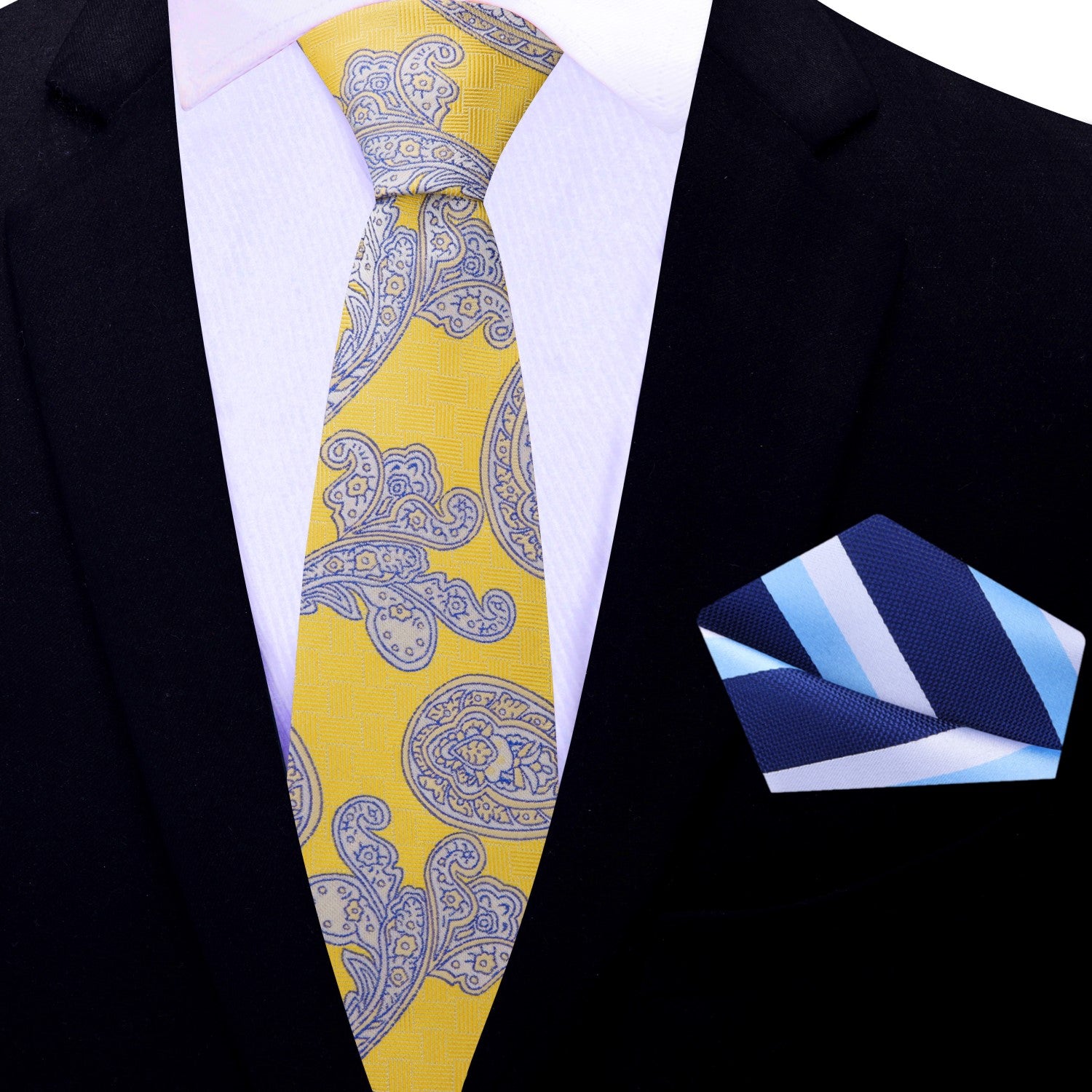 Elegant wedding guest adorned in a blue suit paired with a vibrant paisley tie.