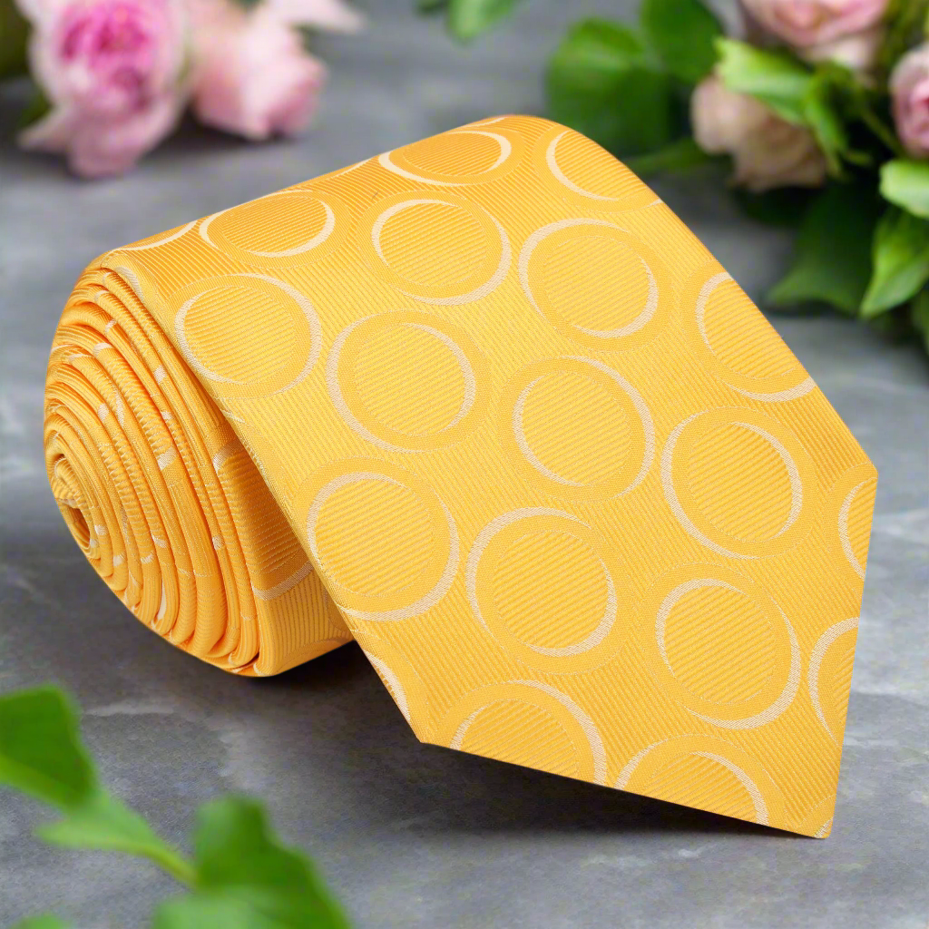 Close-up of Thornebury Vibrant Silk Necktie showcasing its cheerful yellow and white circular rings pattern.