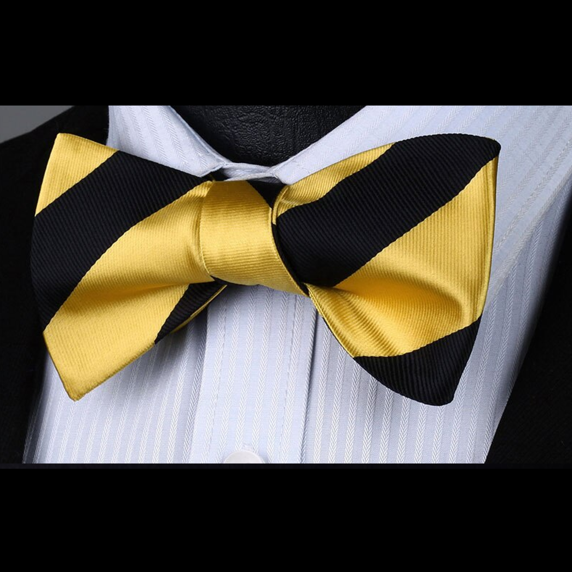 Styled shot of a striped bow tie and matching pocket square for cocktail party outfit