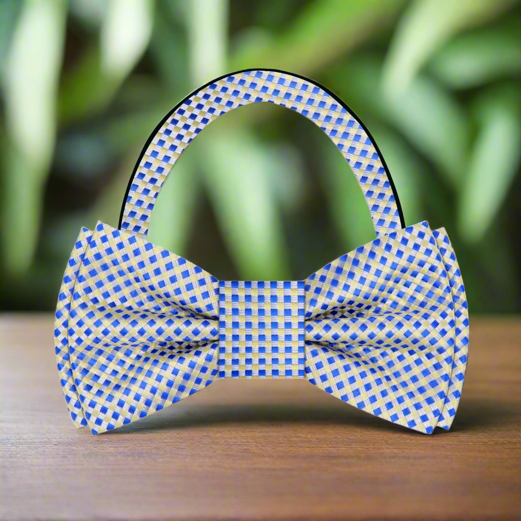 Front view of blue and yellow check bow tie on a model for formal wear