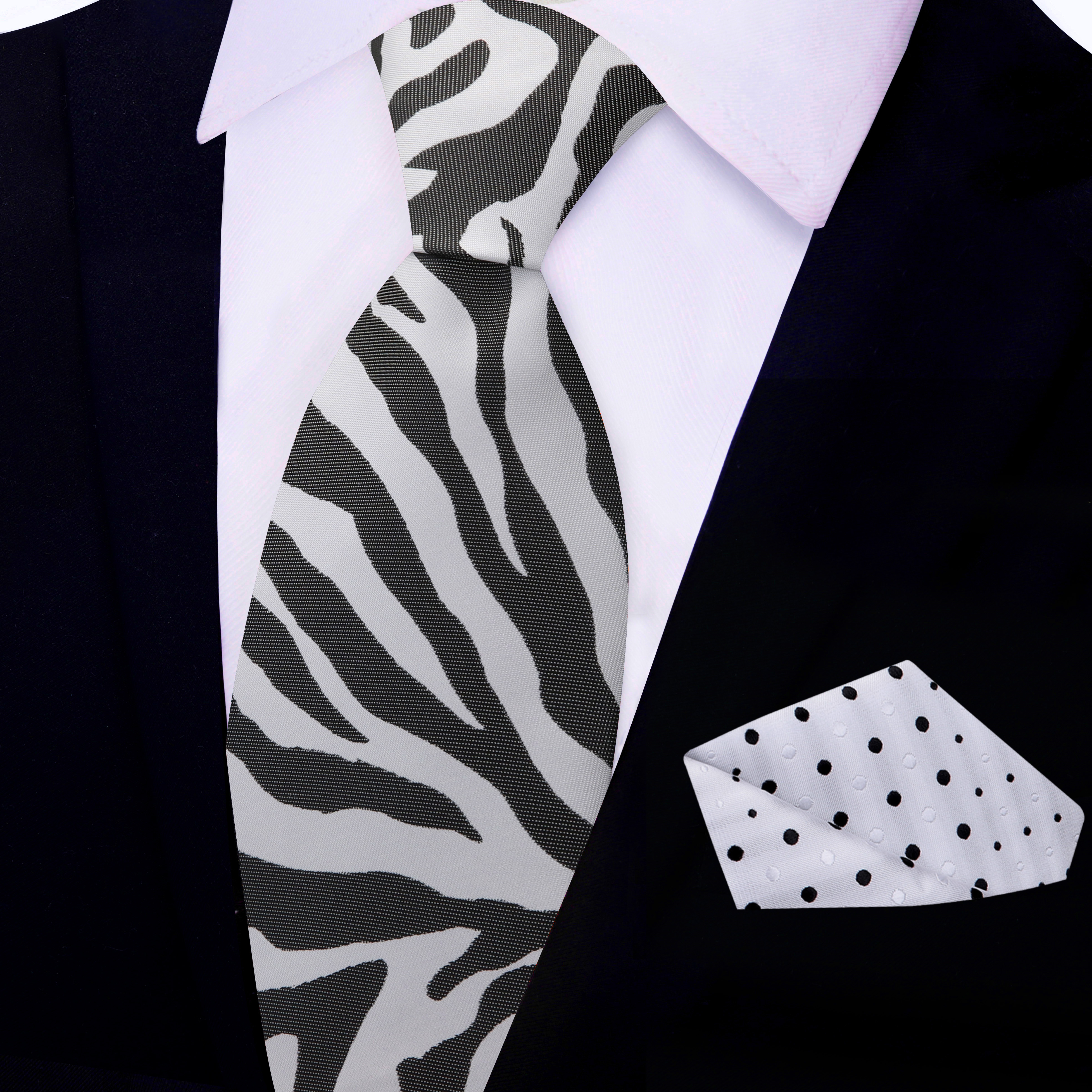Close-up of a zebra tie with bold black and grey pattern for formal wear