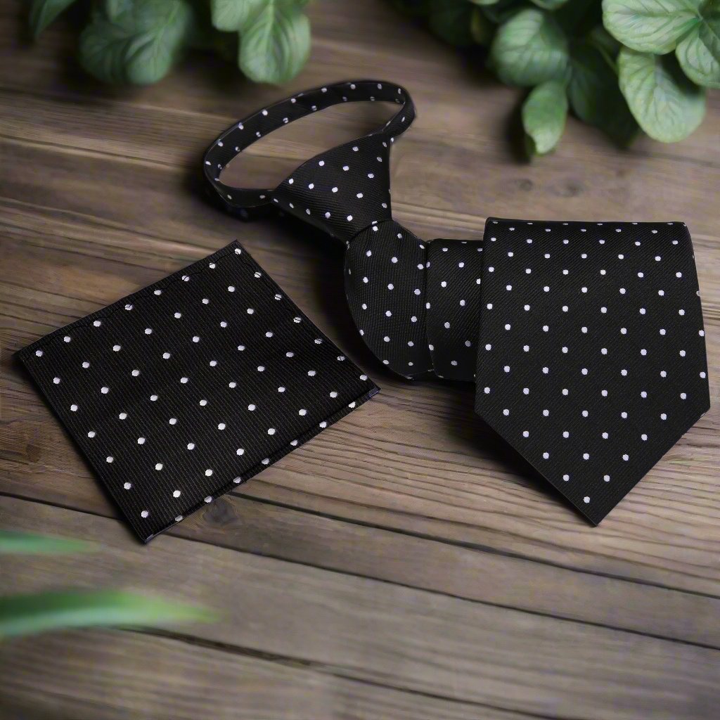 Man wearing a polka dot necktie with a matching pocket square, suited for weddings