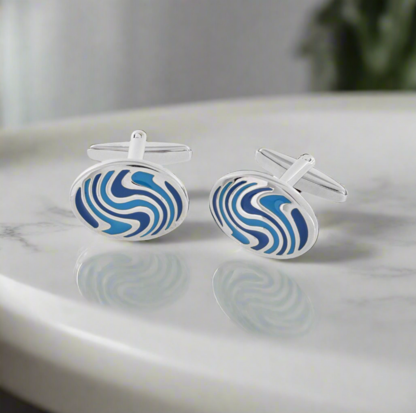Elegant blue fingerprint cufflinks with chrome finish, perfect for formal occasions