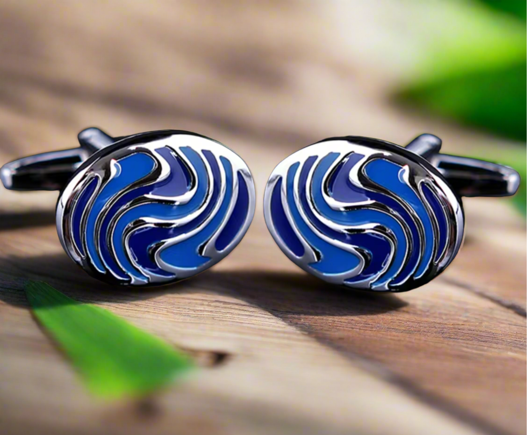 Chrome cufflinks with blue fingerprints and swirl design, ideal for weddings