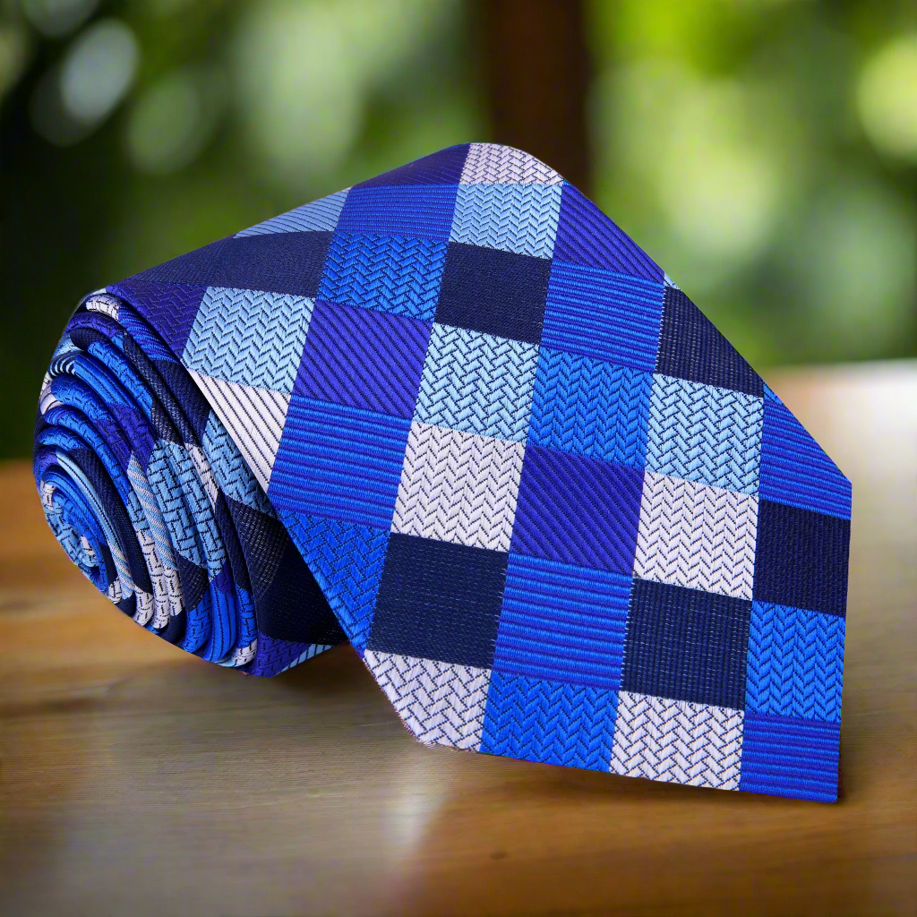 Man wearing a stylish geometric silk necktie at a formal event
