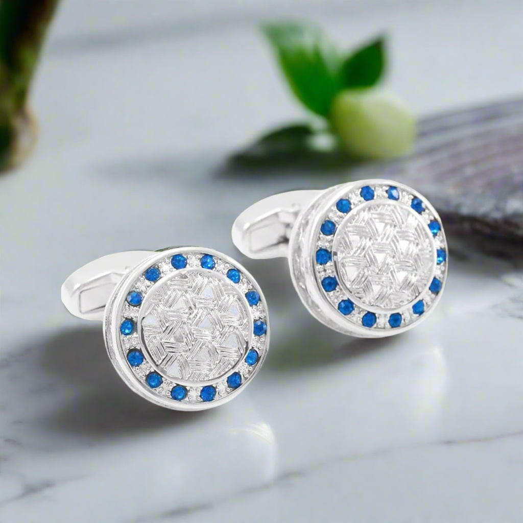 Regal gold cufflinks paired with a navy blue suit, demonstrating their elegance for business meetings.