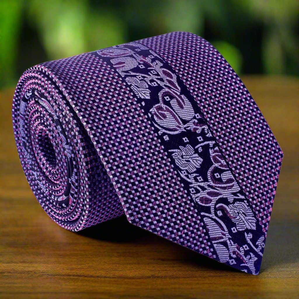 Close-up of designer floral necktie with metallic purple and checkered border for formal occasions