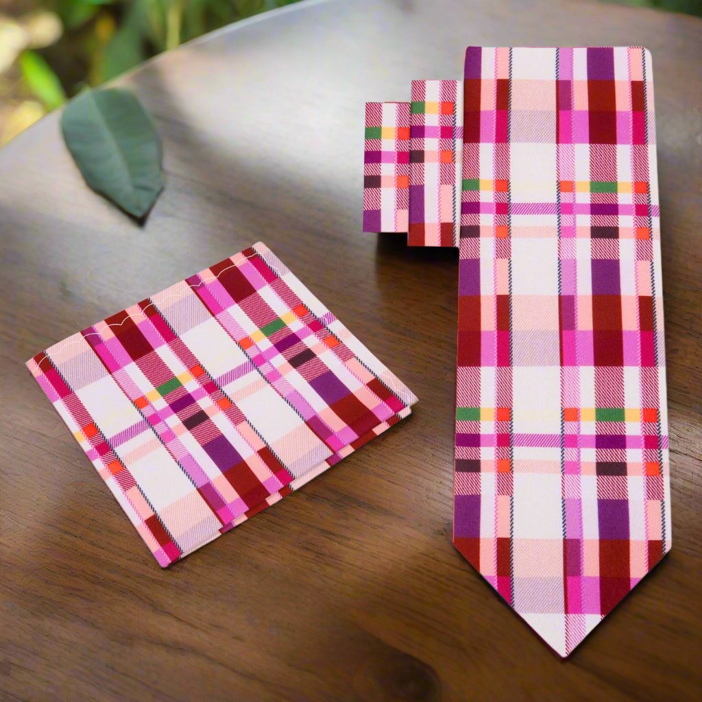 Close-up of the abstract plaid pattern on the silk necktie, highlighting the intricate design and luxurious texture.