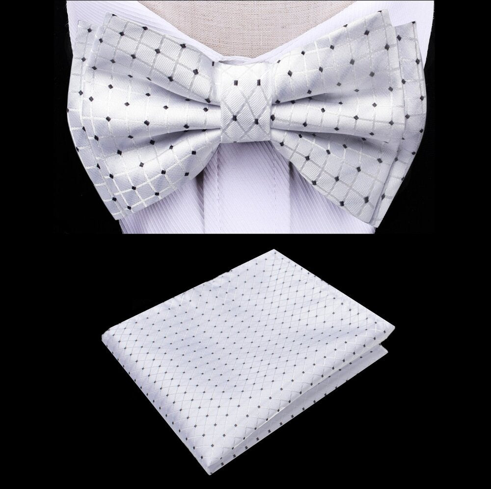Pre-tied kids bow tie and pocket square set displayed on a white background, showcasing the polka dot design.