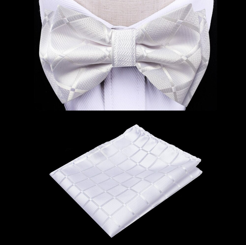 Close-up of kids white bow tie with geometric pattern for formal wear