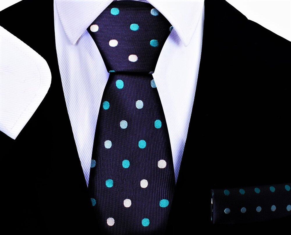 Close-up of stylish silk necktie and pocket square set for boys, showcasing the unique polka dot pattern.