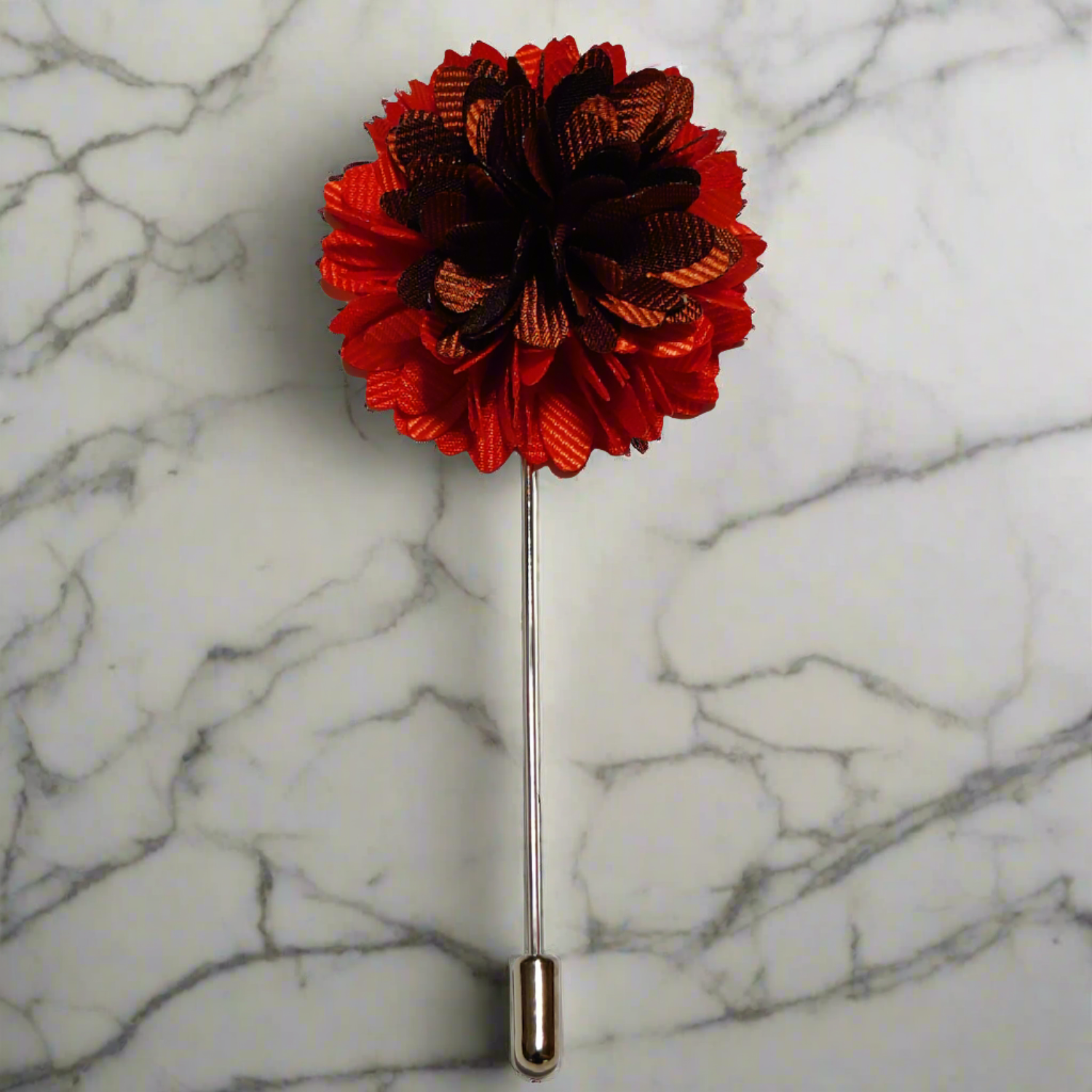 Close-up of luxury blossom lapel pin on a suit lapel highlighting intricate details