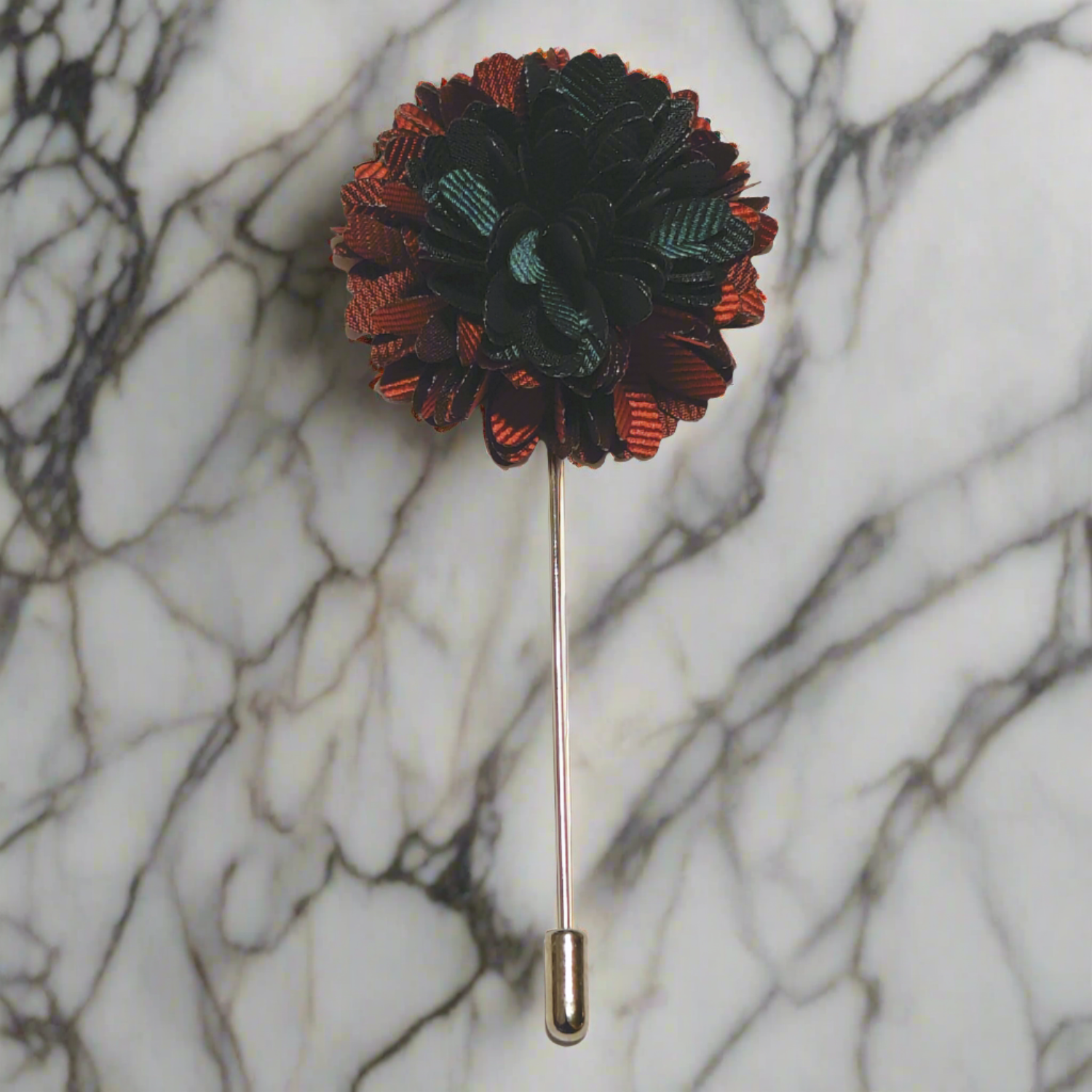 Close-up of a handcrafted flower lapel pin with intricate petal details