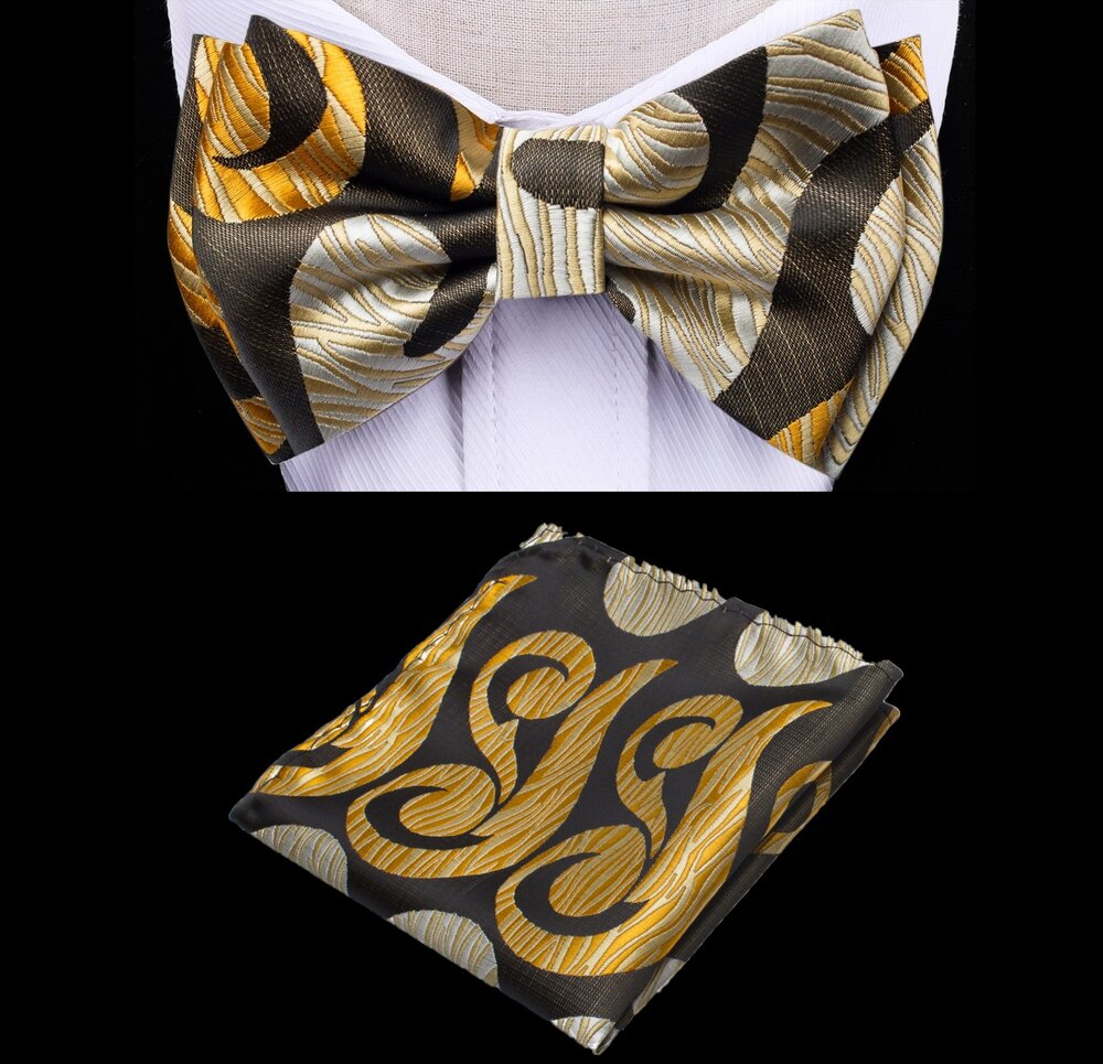 Close-up of pre-tied bow tie with abstract pattern in brown and yellow for boys