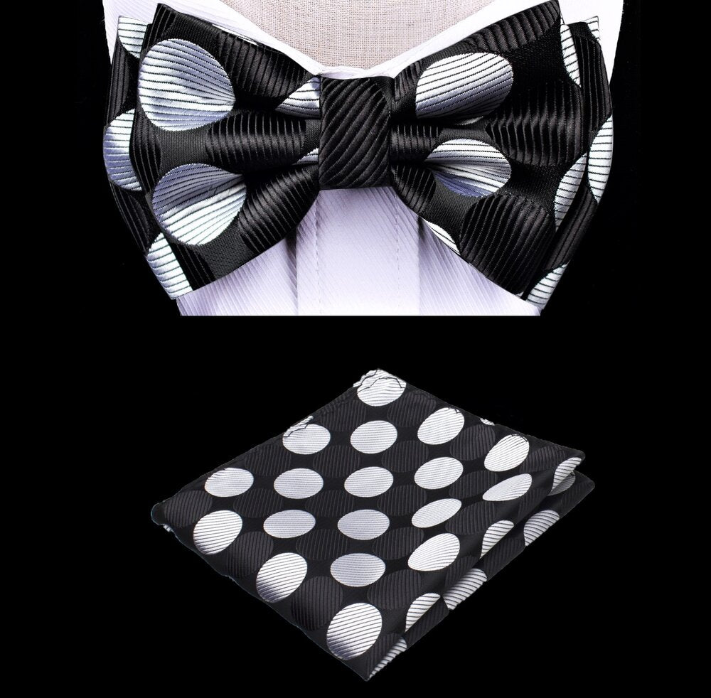 Kids black bow tie with large polka pattern for formal events