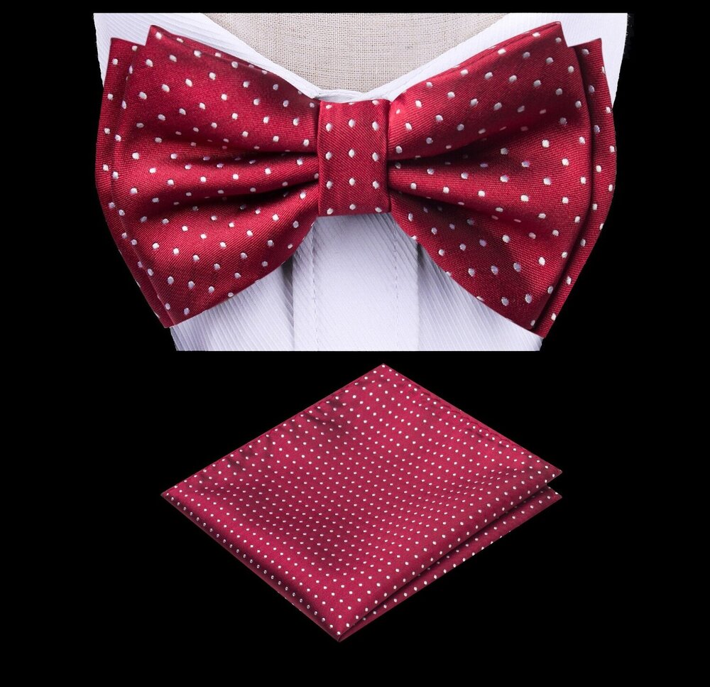 Front view of kids cranberry bow tie and pocket square set on a child in formal wear