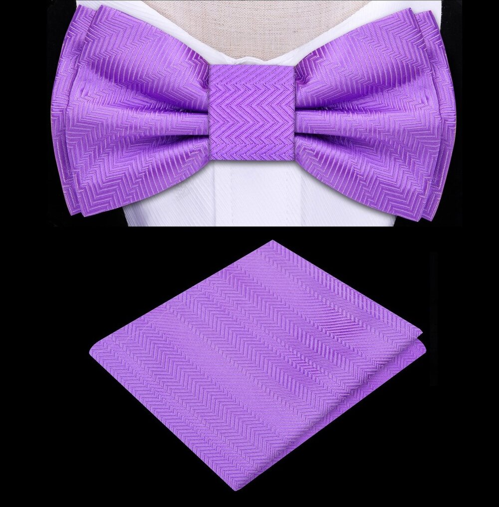 Amethyst purple kids bow tie and pocket square set displayed on a wooden table.