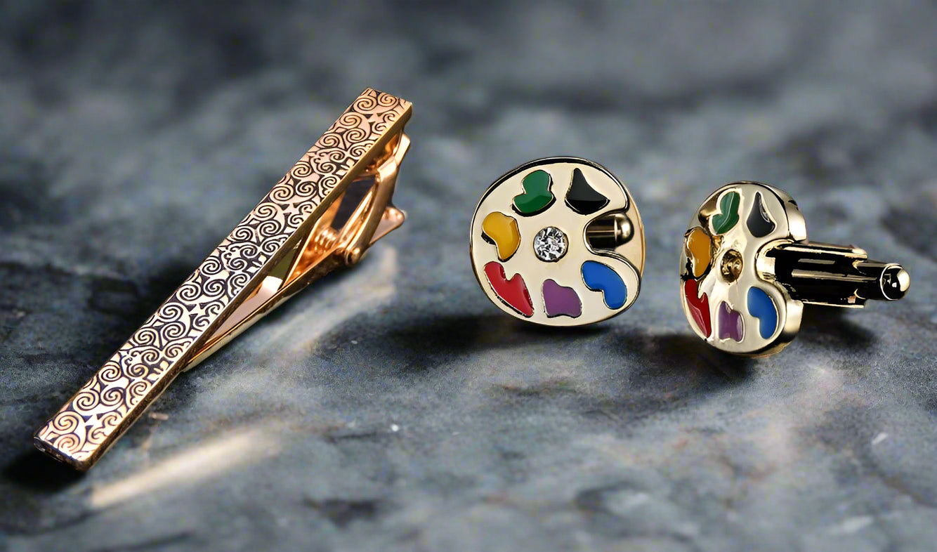 Close-up of artist palette cufflinks with multicolored enamel accents for art lovers