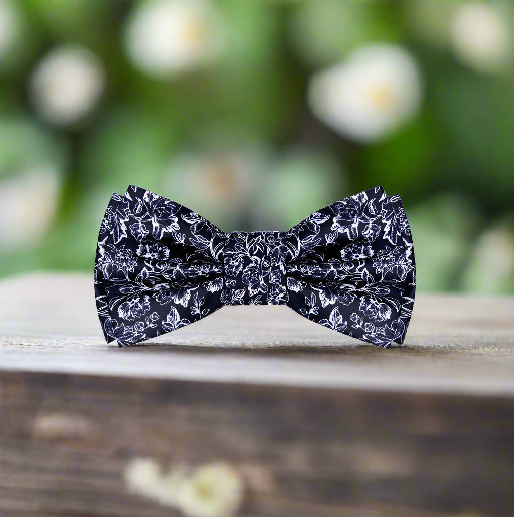 Light beige silk bow tie styled with a crisp dress shirt for upscale events