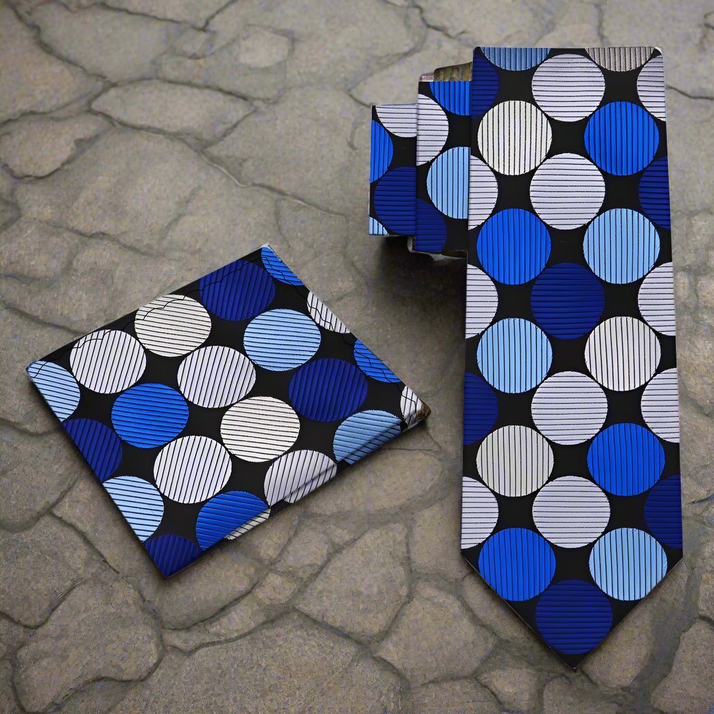 Man wearing a colorful polka dot tie at a wedding, displaying a stylish and confident look.