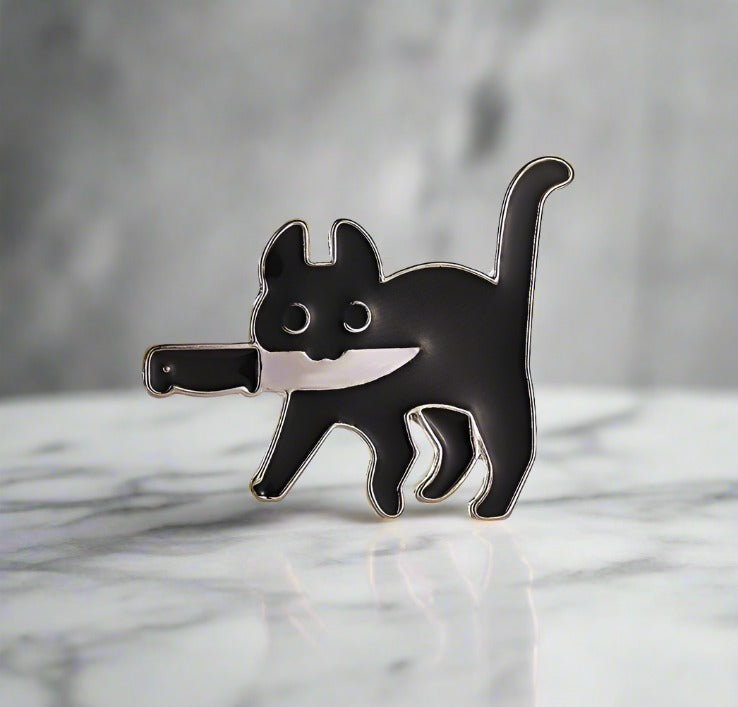 Styled example of the cat lapel pin on a denim jacket, perfect for casual outings.