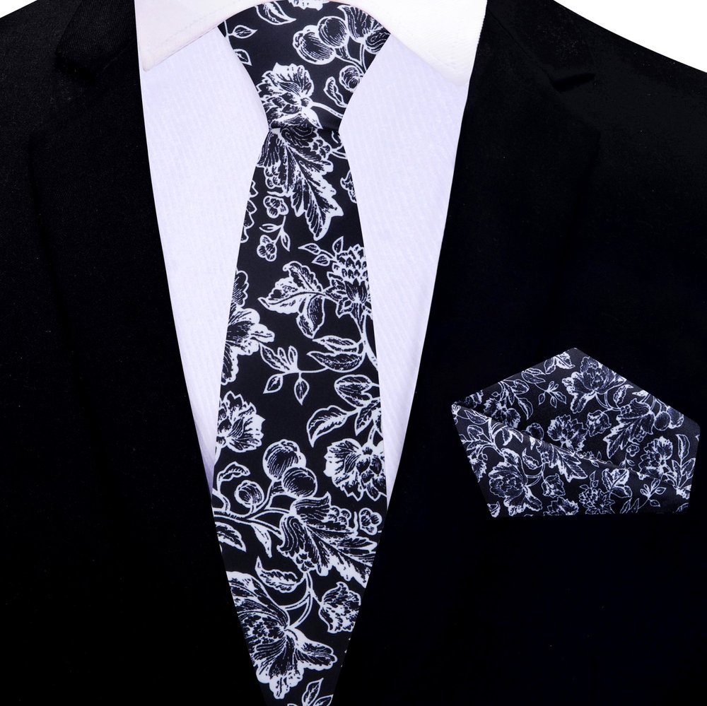Dark pink silk tie with filigree pattern styled with navy suit — best formal silk necktie for weddings
