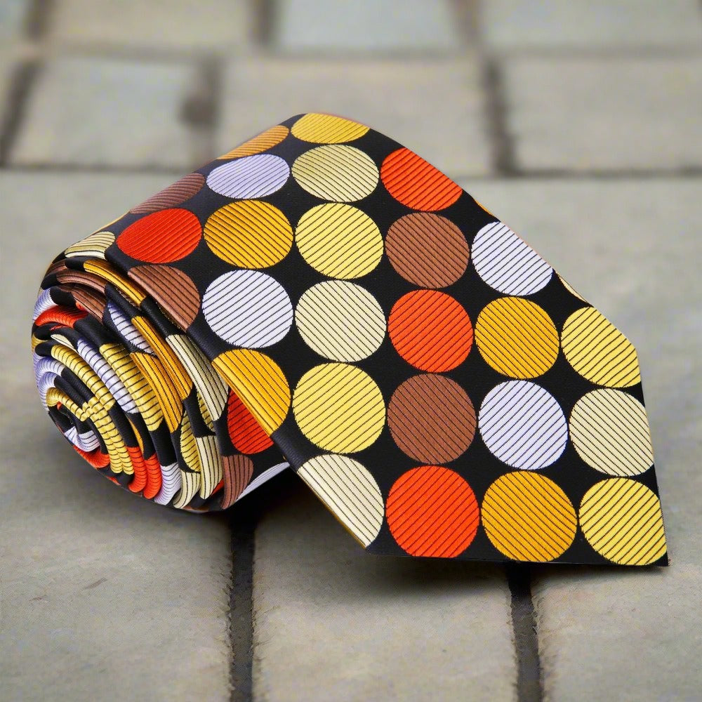 Large polka dot silk necktie in vibrant colors, showcasing the bold pattern against a white shirt.