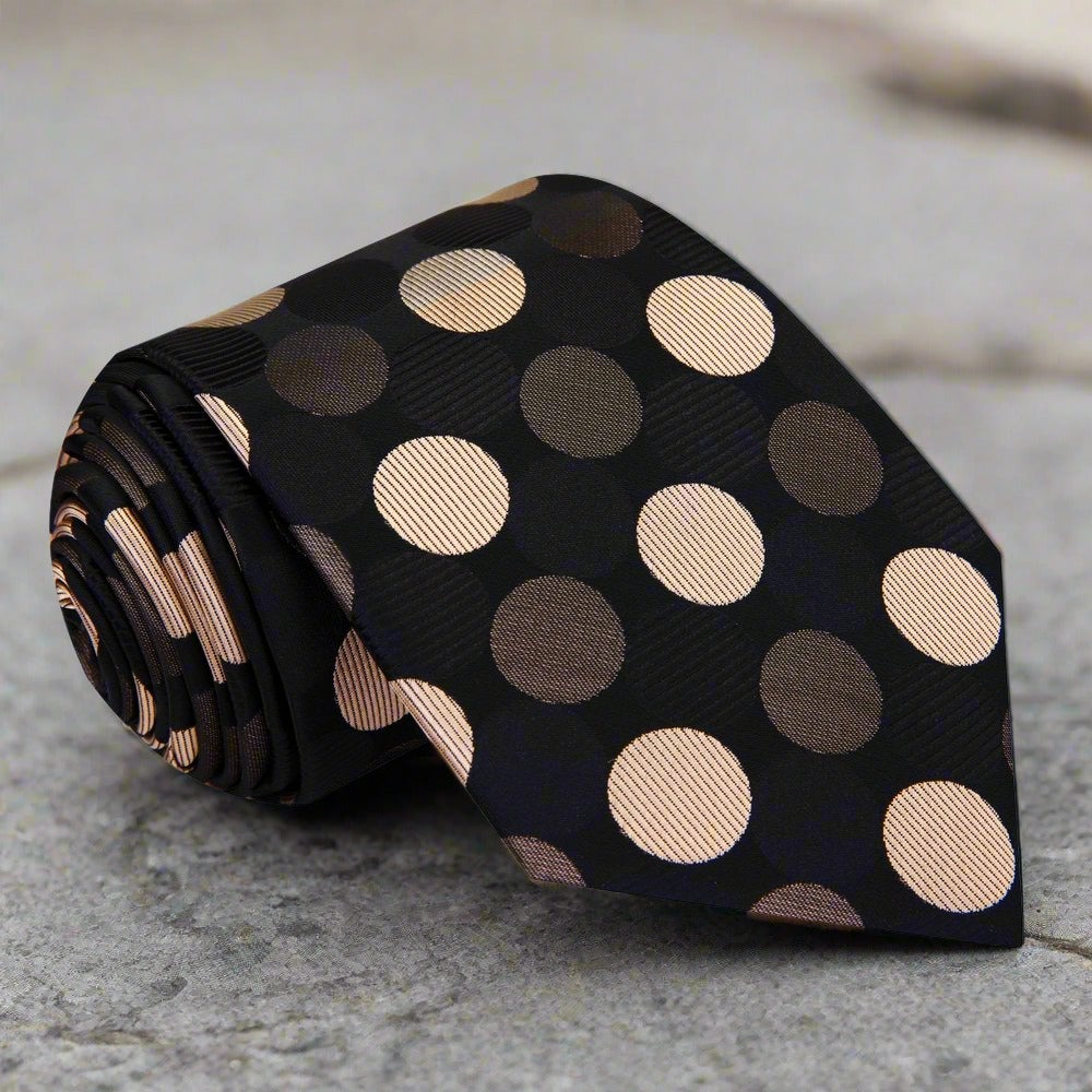 Close-up of the vibrant polka dot silk necktie, emphasizing the texture and quality of the fabric.