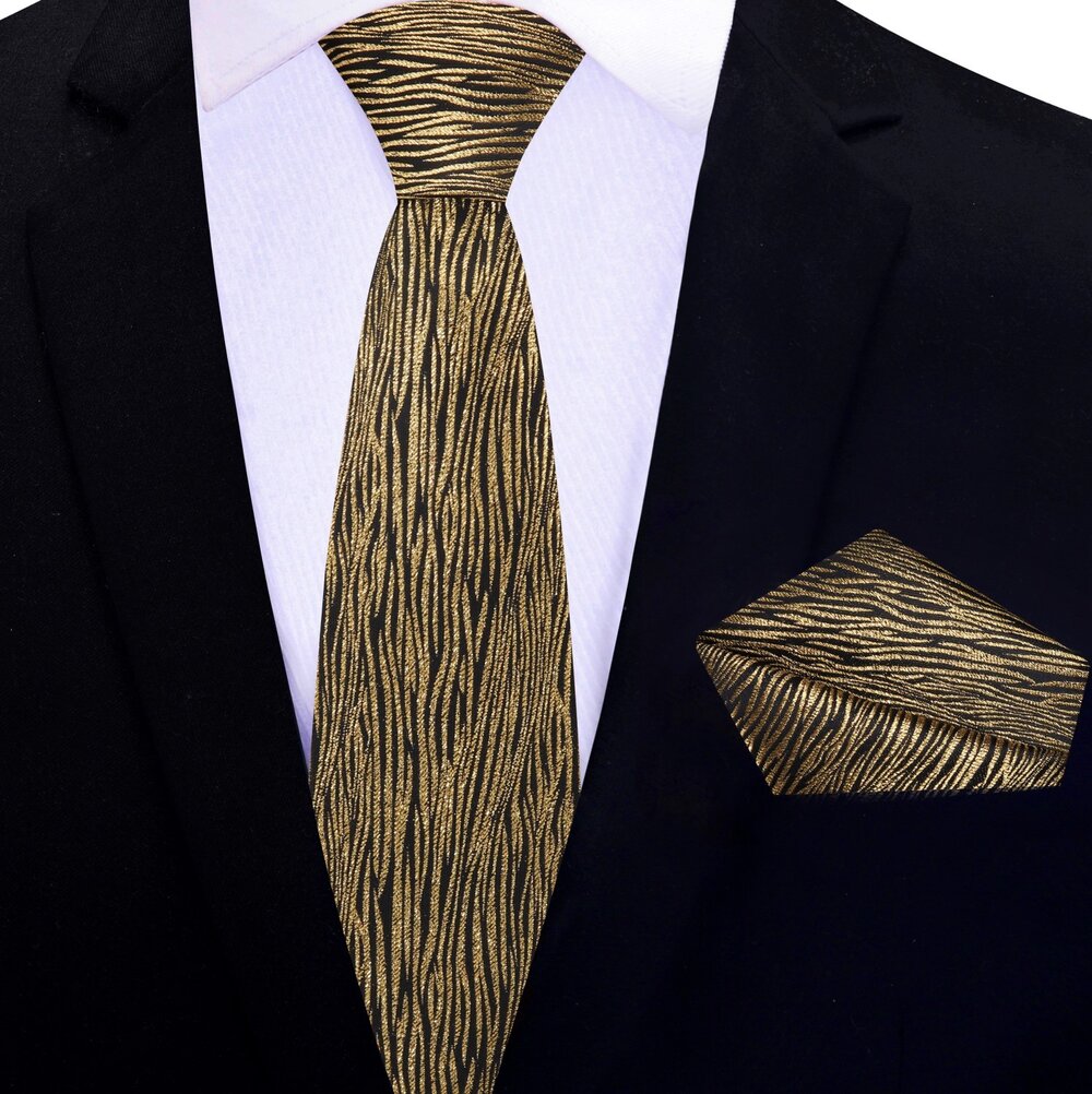 Premium silk necktie paired with a matching pocket square for formal occasions.