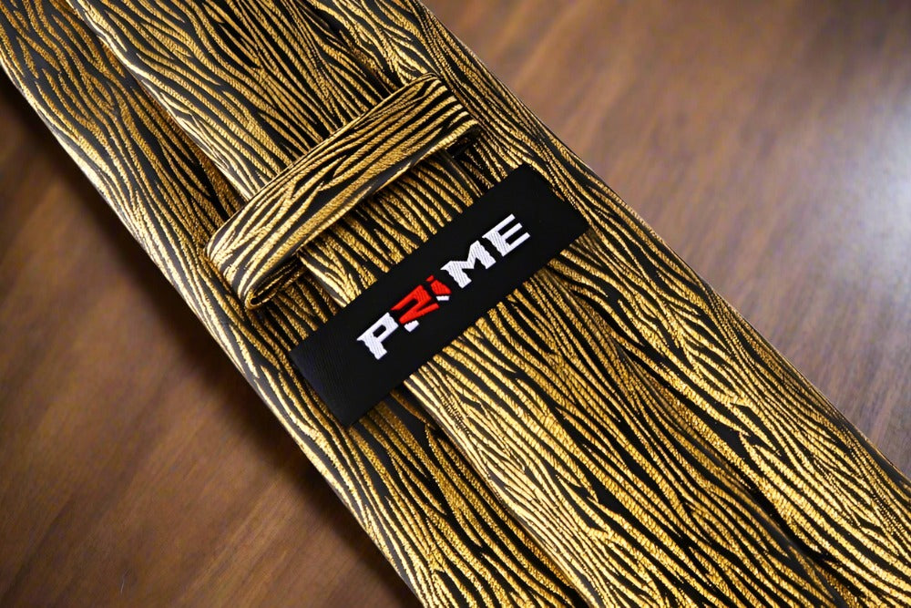 Elegant zebra design necktie showcasing black and gold silk pattern.