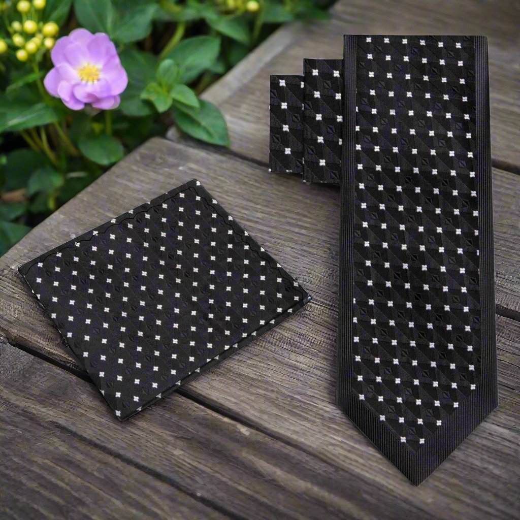 Graftwick silk tie paired with a light grey dress shirt, illustrating the cohesive look for casual and formal occasions.